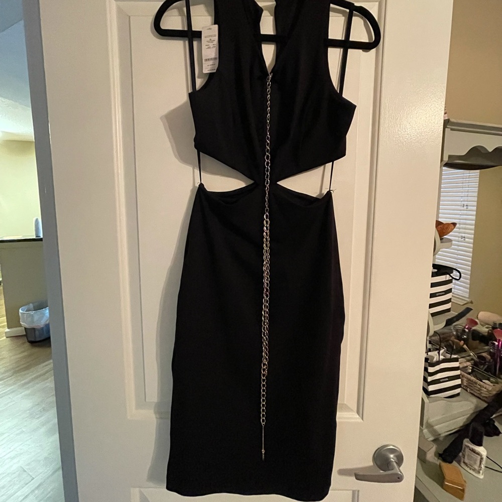 Sexy, yet elegant black dress. Never worn